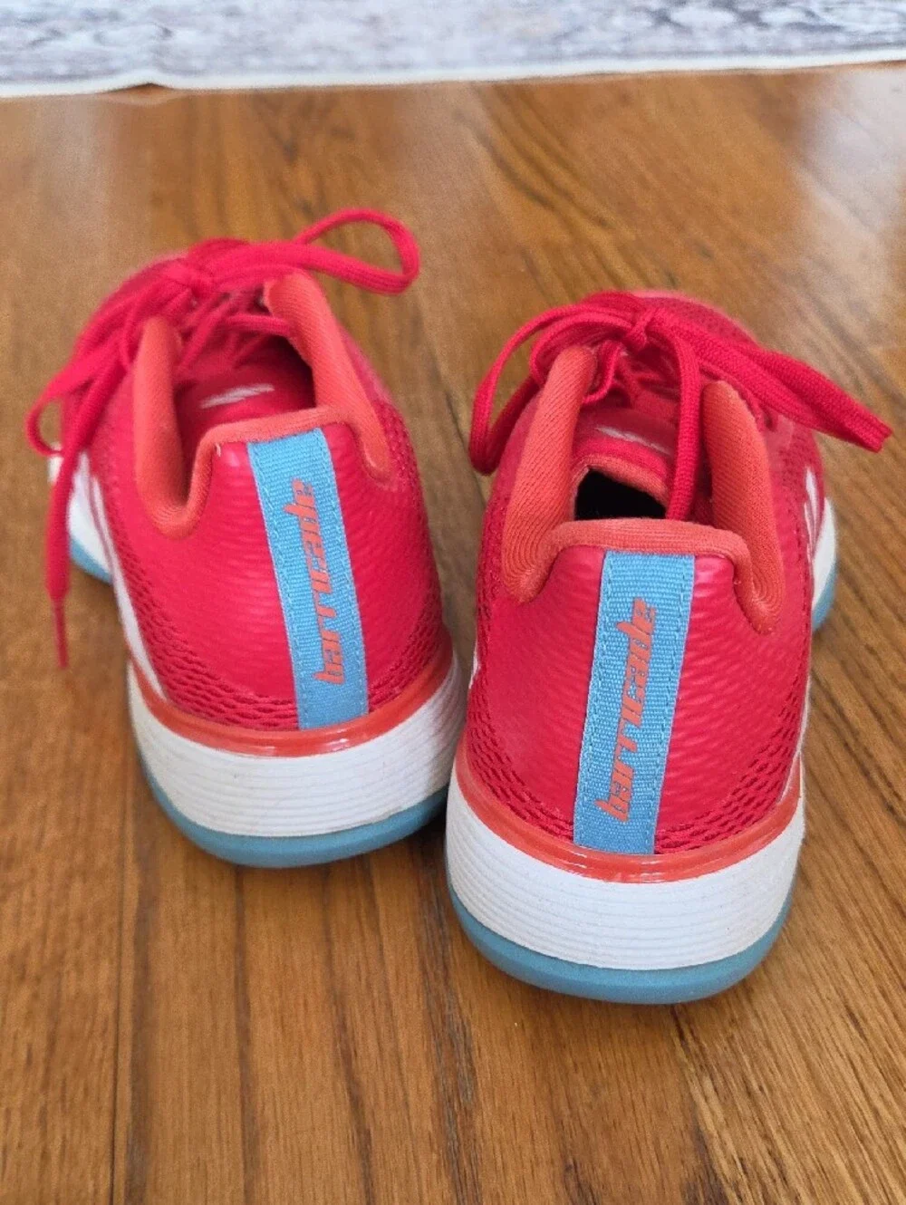 Red ADIDAS Tennis Shoes with Blue Soles